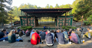 A crowd sitting in front of a talk at PauseOnError 2023.